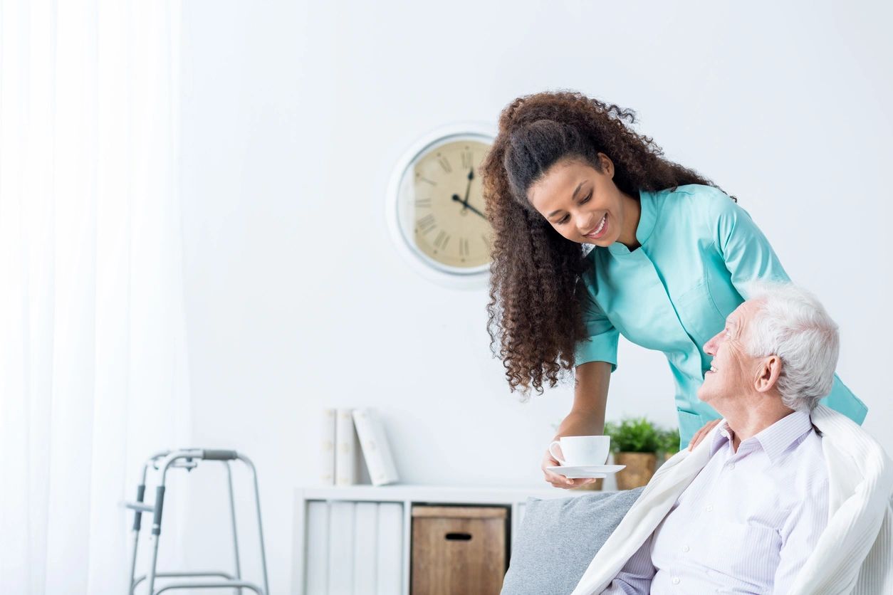 nurse giving a coffee